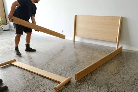 Bed frame assembly Singapore — handyman assembling wooden IKEA bed frame, mattress frame assembly service